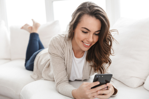 Girl on couch on phone